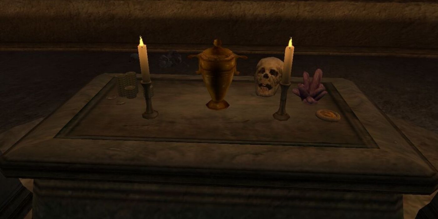 A table with a candle and an urn in Skyrim Annviersary Edition