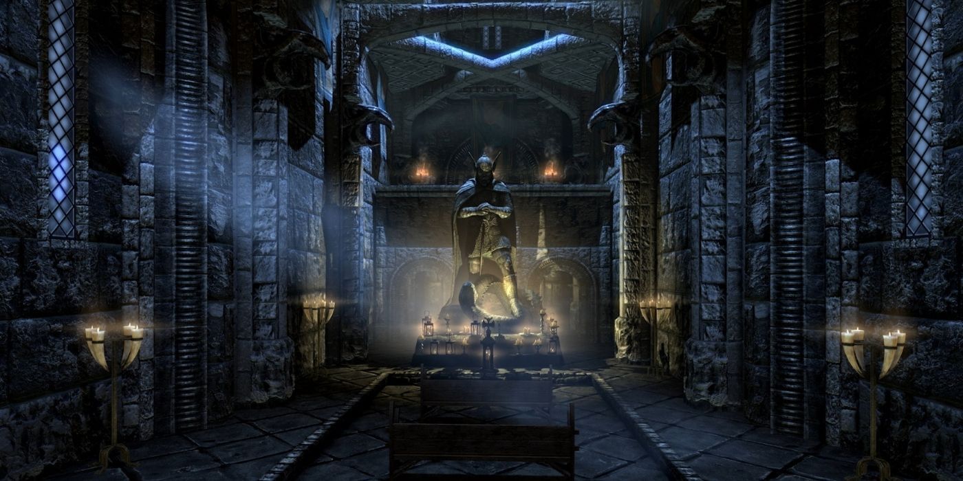 A dark room with a large statue at the end in Skyrim Anniversary Edition