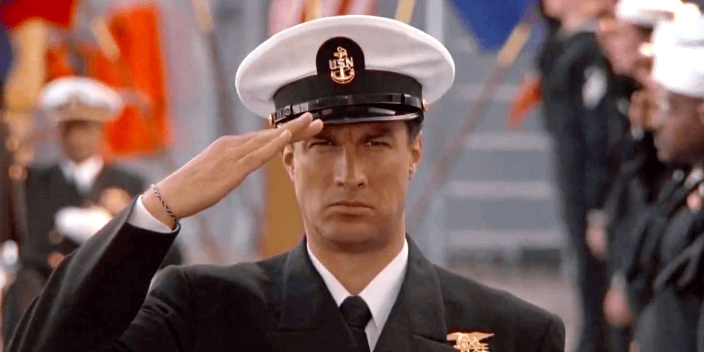 Steven Seagal in Under Siege saluting in uniform.