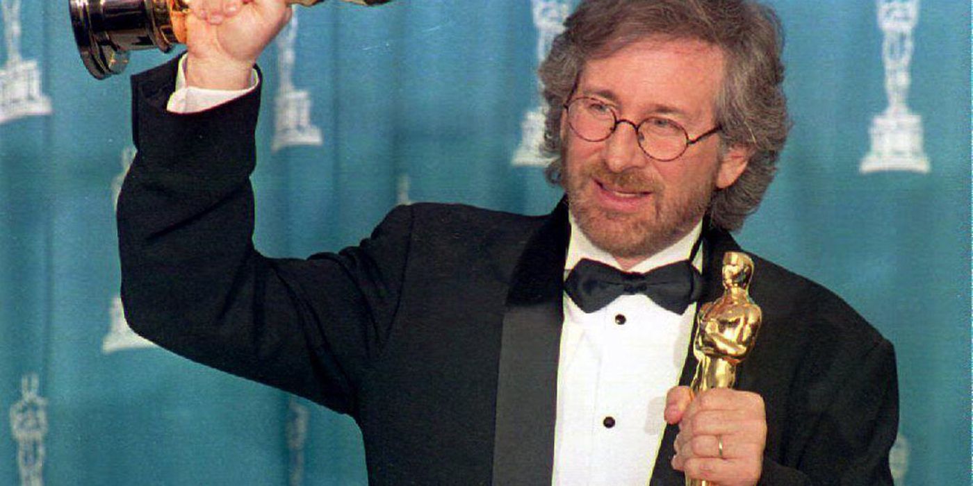 Steven Spielberg holding his Oscars.