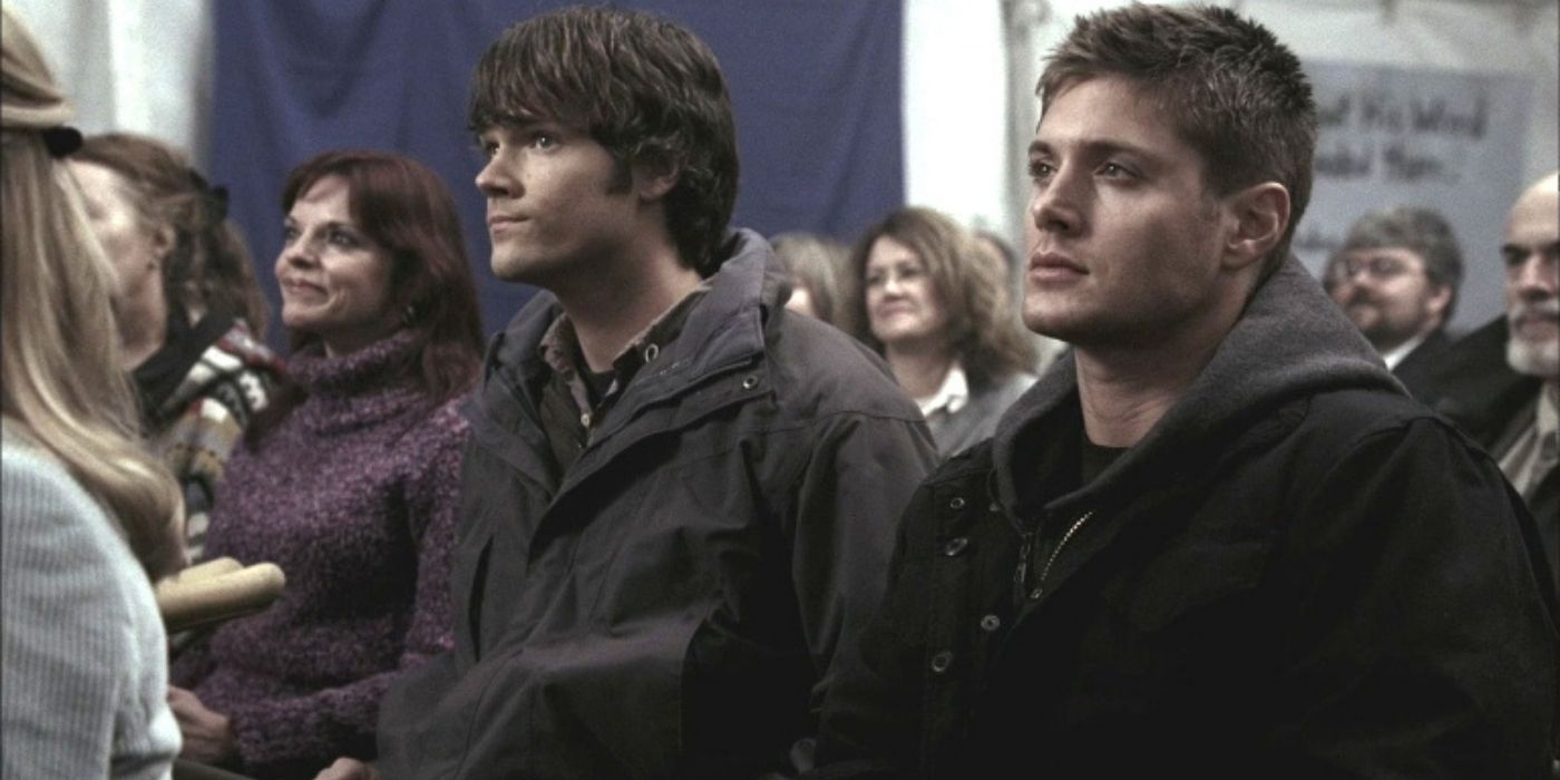 Sam and Dean at an assembly for a faith healer in Supernatural