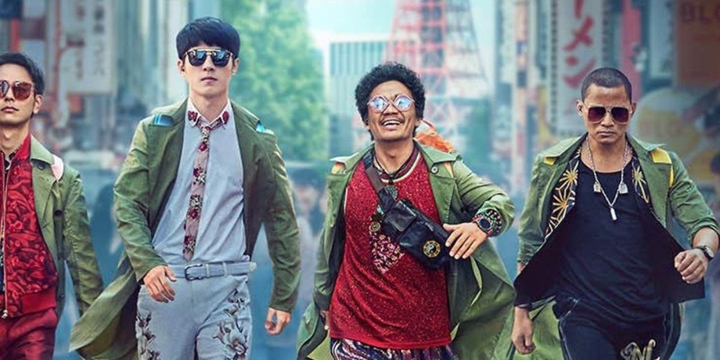 Tang, Qin, Noda, and Jack walk through the street in Detective Chinatown 3