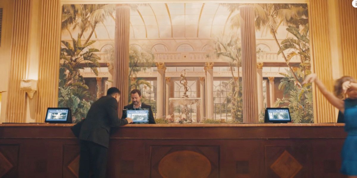 The mural behind a hotel desk in the Delicate music video.