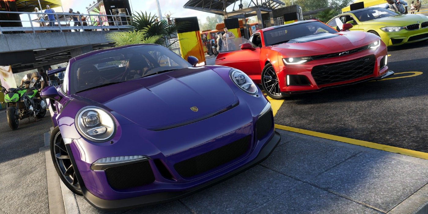 Two cars race round a track in The Crew 2.