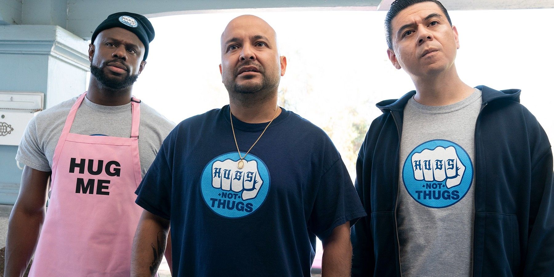 Three characters standing on a porch in This Fool