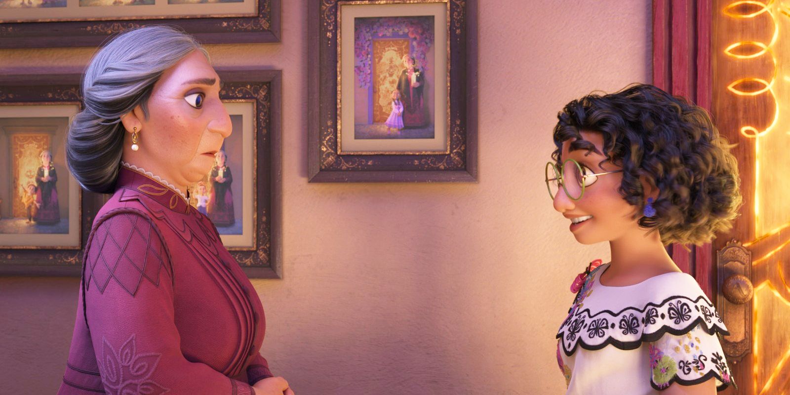Mirabel and Abuela have a conversation in a hallway in Disney's Encanto