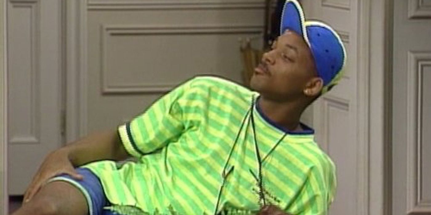 Will Smith reclines on a couch from Fresh Prince of Bel Air