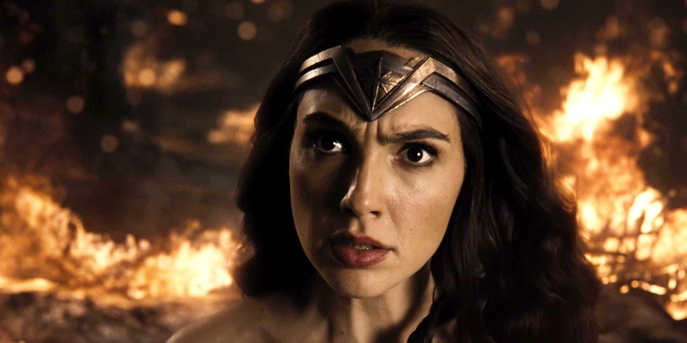 Wonder Woman looking upset as fire rages behind her in Zack Snyder's Justice League