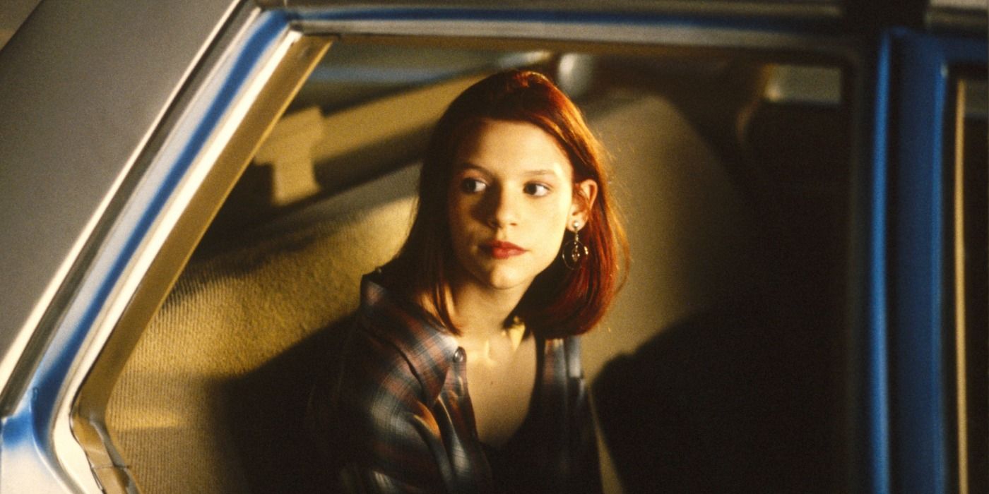 Claire Danes plays Angela Chase sitting in the back of a car. 