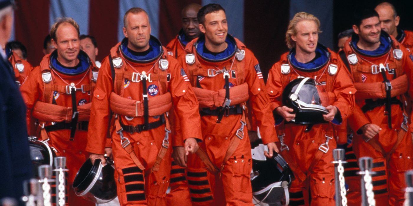 Crew in orange suits in Armageddon.