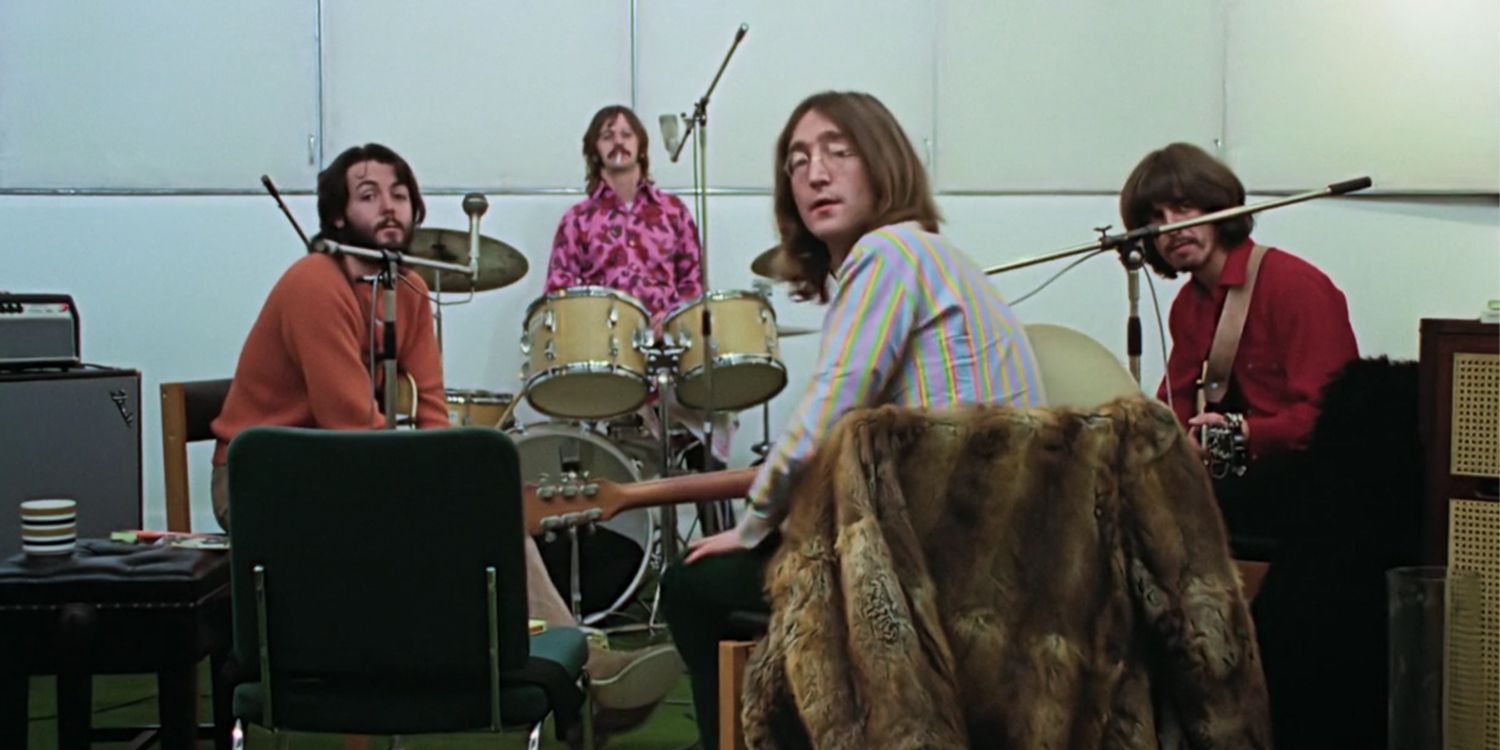 The Beatles take a break from playing music in The Beatles: Get Back.