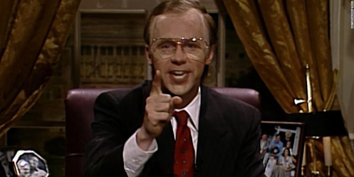 Dana Carvey dressed as George H.W. Bush and pointing in a sketch from Saturday Night Live.