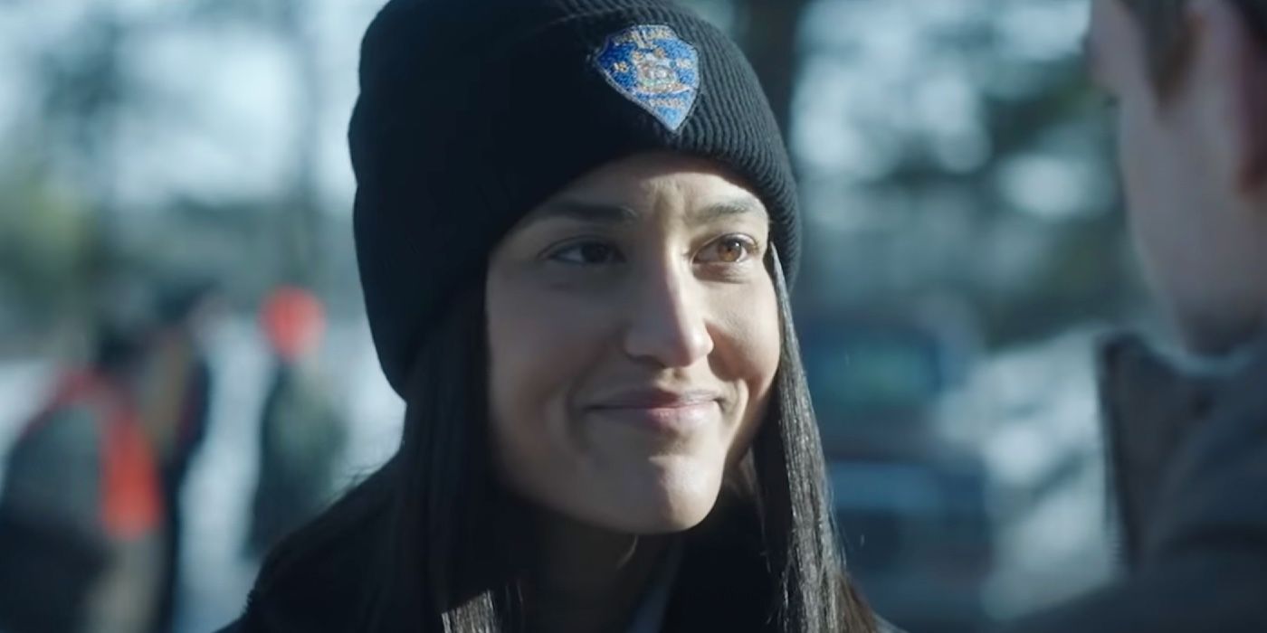 Angela smiles at Dexter: New Blood, wearing a toque and smiling.