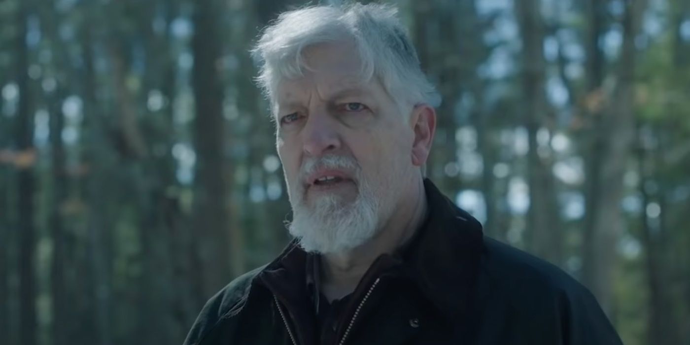 Kurt from Dexter: New Blood, standing outside, talking with white hair and a beard.