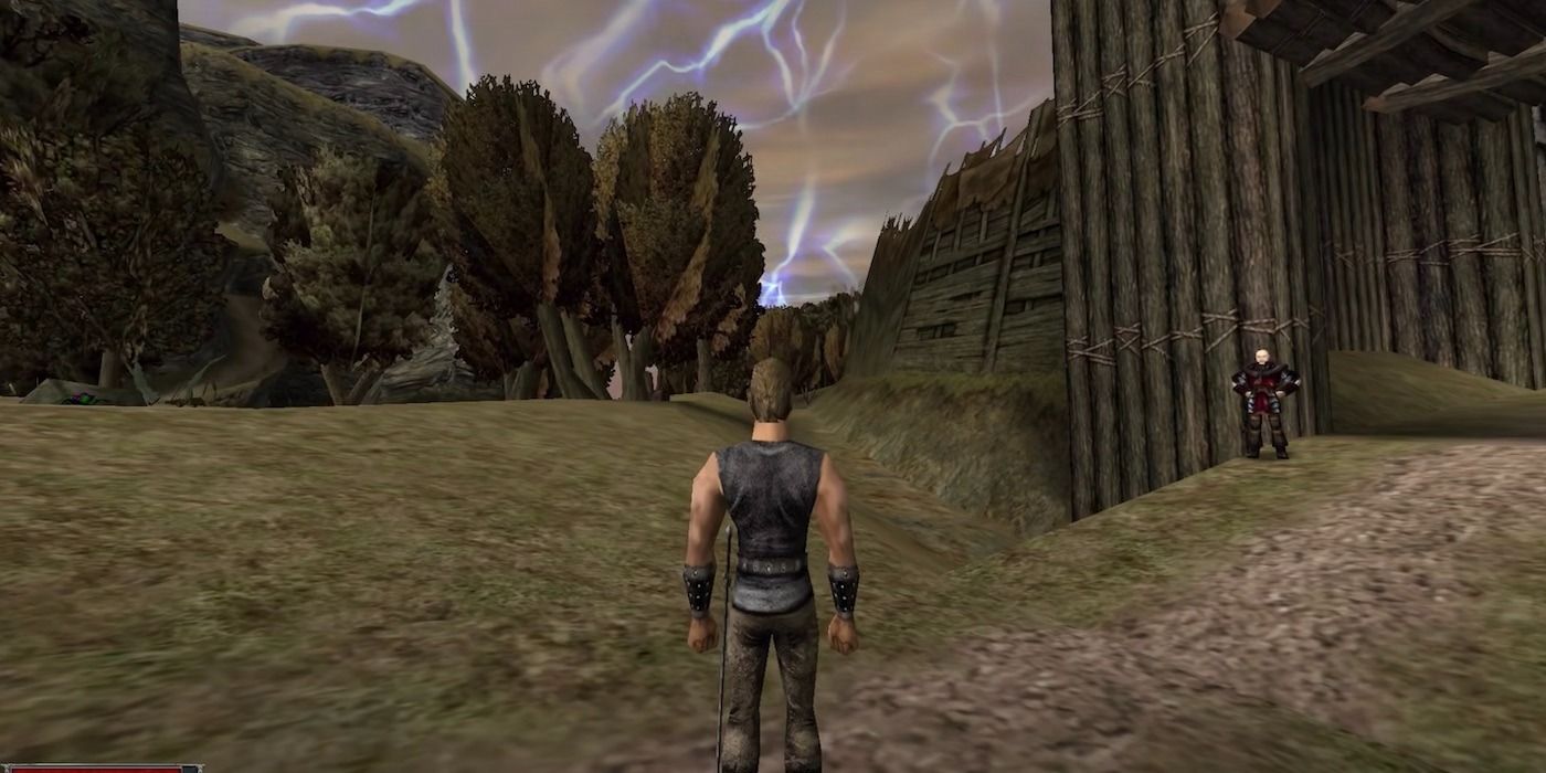 Main character in the RPG Gothic looking at the magic barrier around the prison.