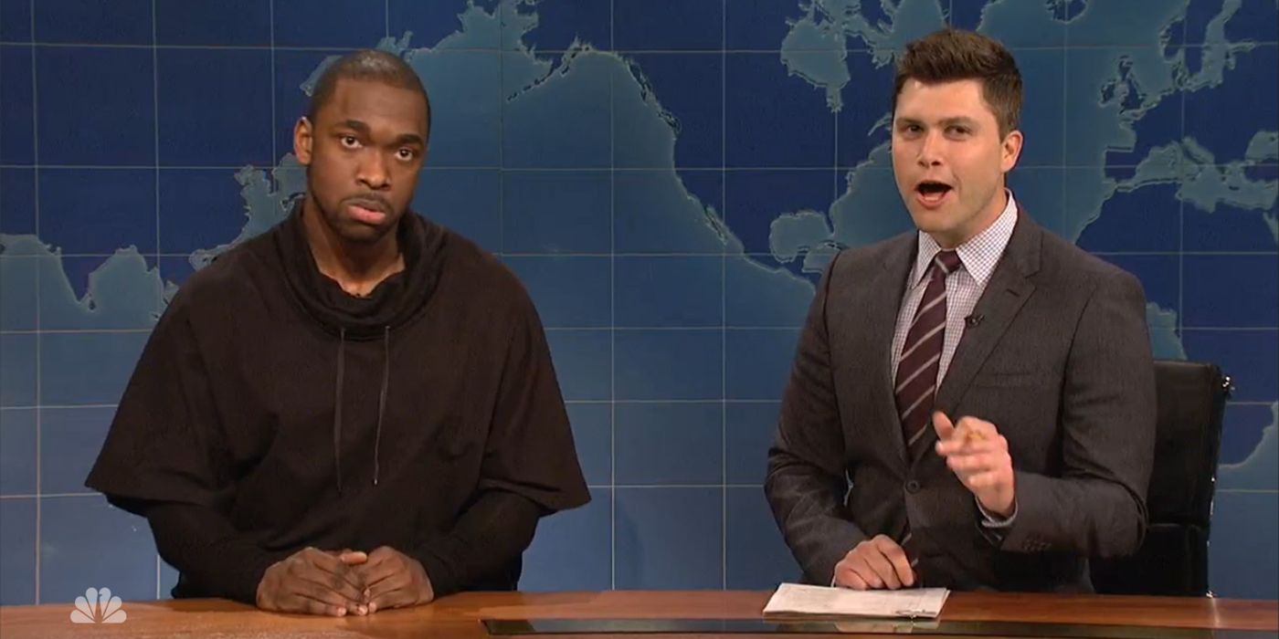 Jay Pharaoh from sitting with Colin Jost at the Weekend Update desk on Saturday Night Live.