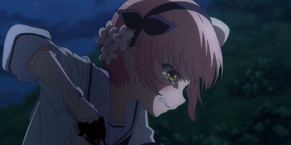 A girl uses a bloody fist to fight in Magical Girl Raising Project