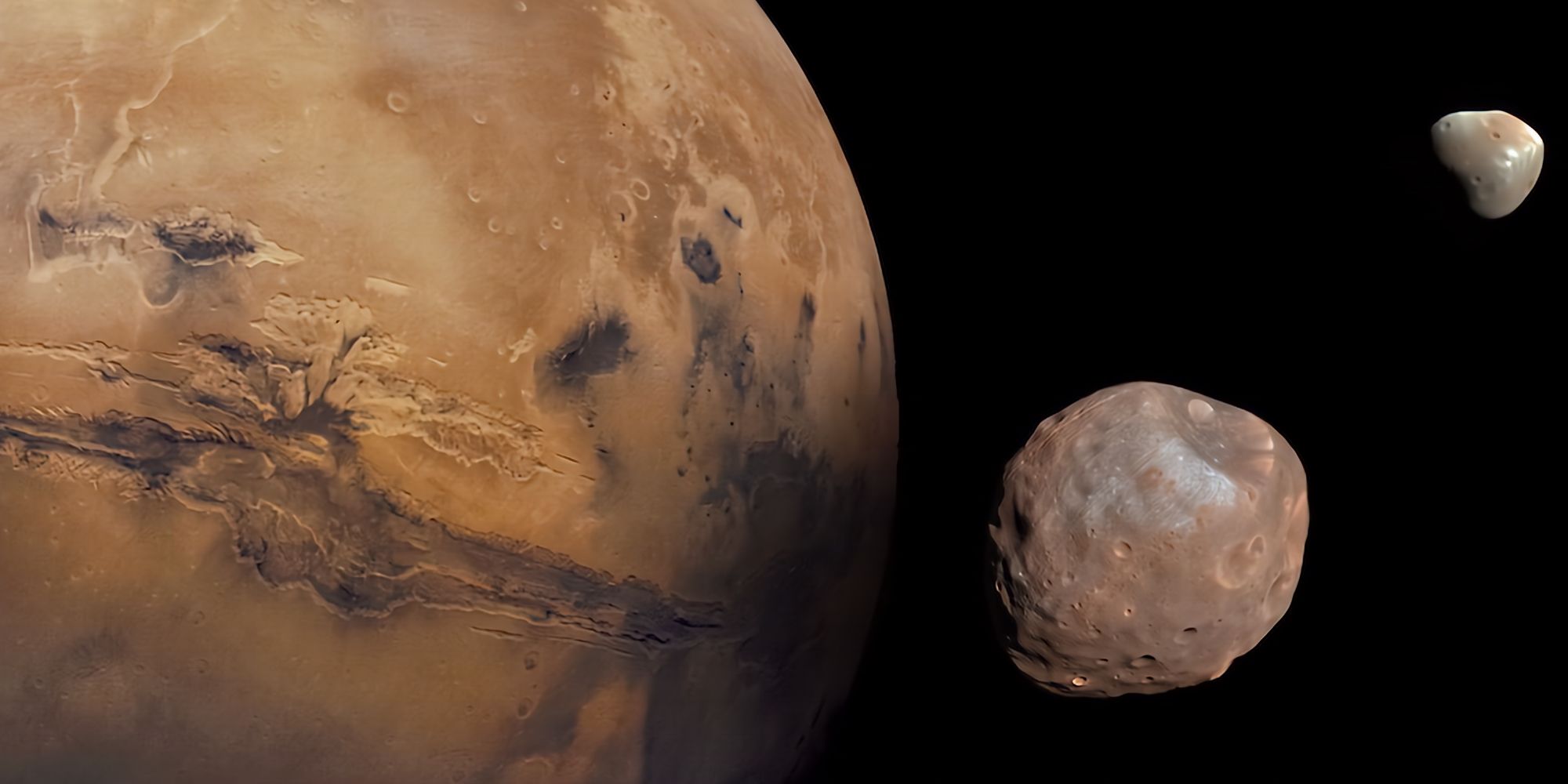 Phobos and Deimos moons next to Mars