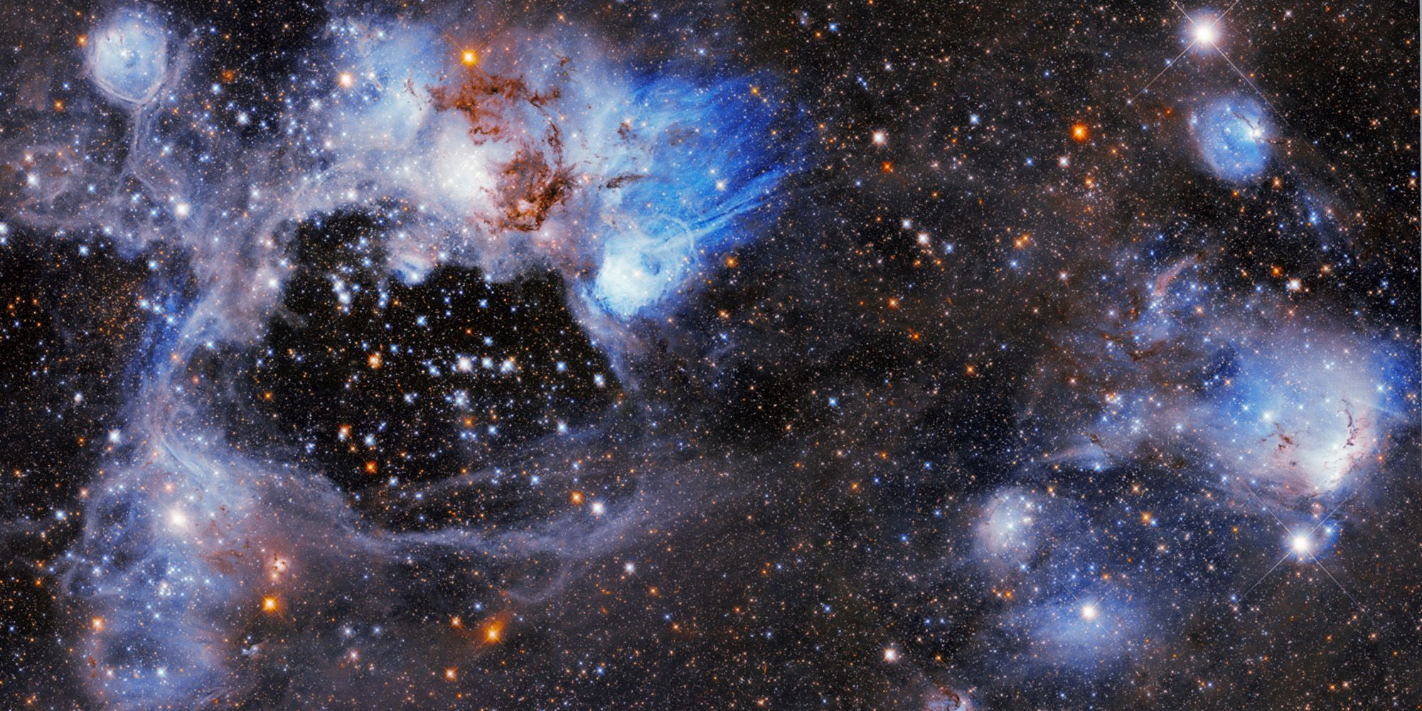Hubble Spies Bizarre Superbubble Tearing Apart A Distant Nebula