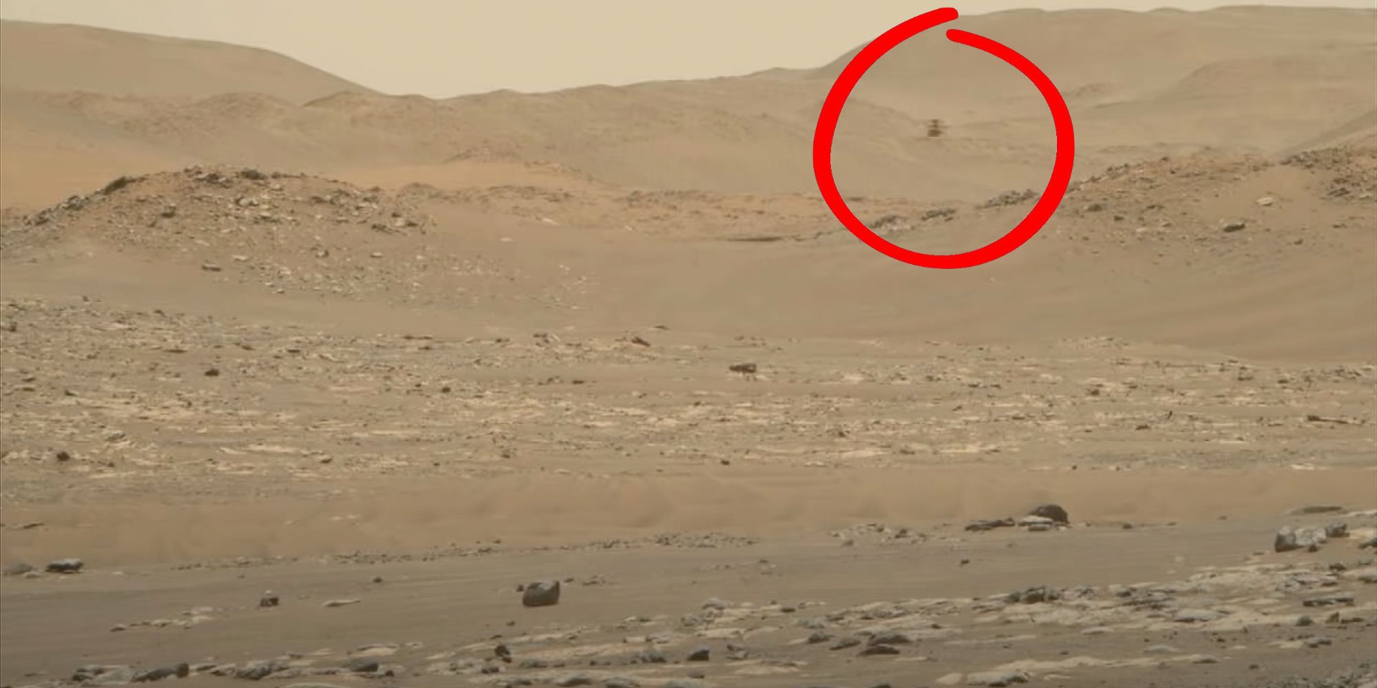 Still image from a video of Ingenuity flying on Mars