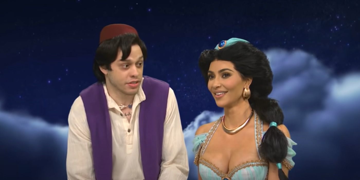 Pete Davidson and Kim Kardashian dressed as Aladdin and Jasmine in a sketch from Saturday Night Live.