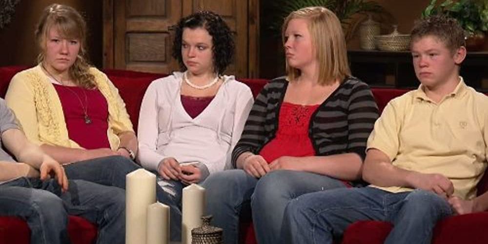 The Brown children sit on the couch on Sister Wives looking serious