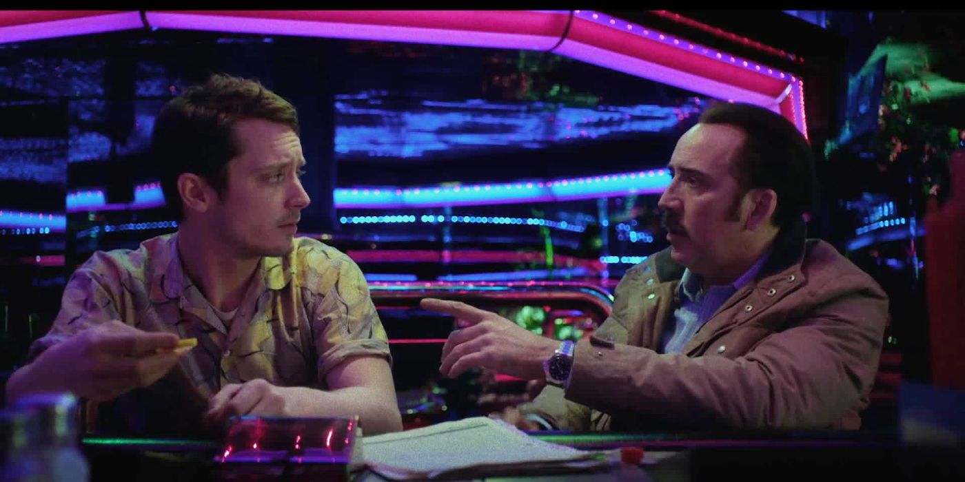 Elijah Wood and Nicolas Cage in The Trust