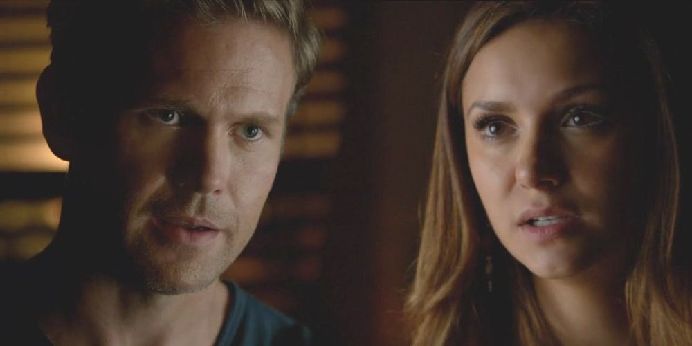 An image of Alaric and Elena looking at each other in The Vampire Diaries