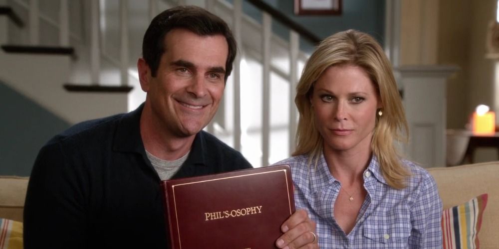 An image of Phil and Claire smiling on Modern Family