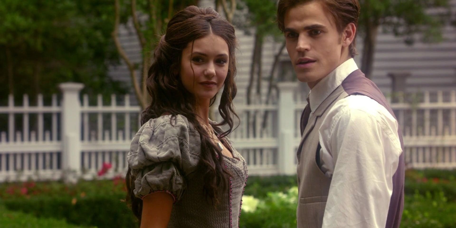 Stefan and Katherine standing together in Mystic Falls in The Vampire Diaries