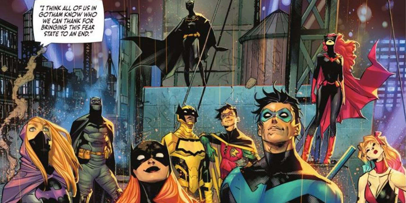 Batman standing behind the Bat Family.
