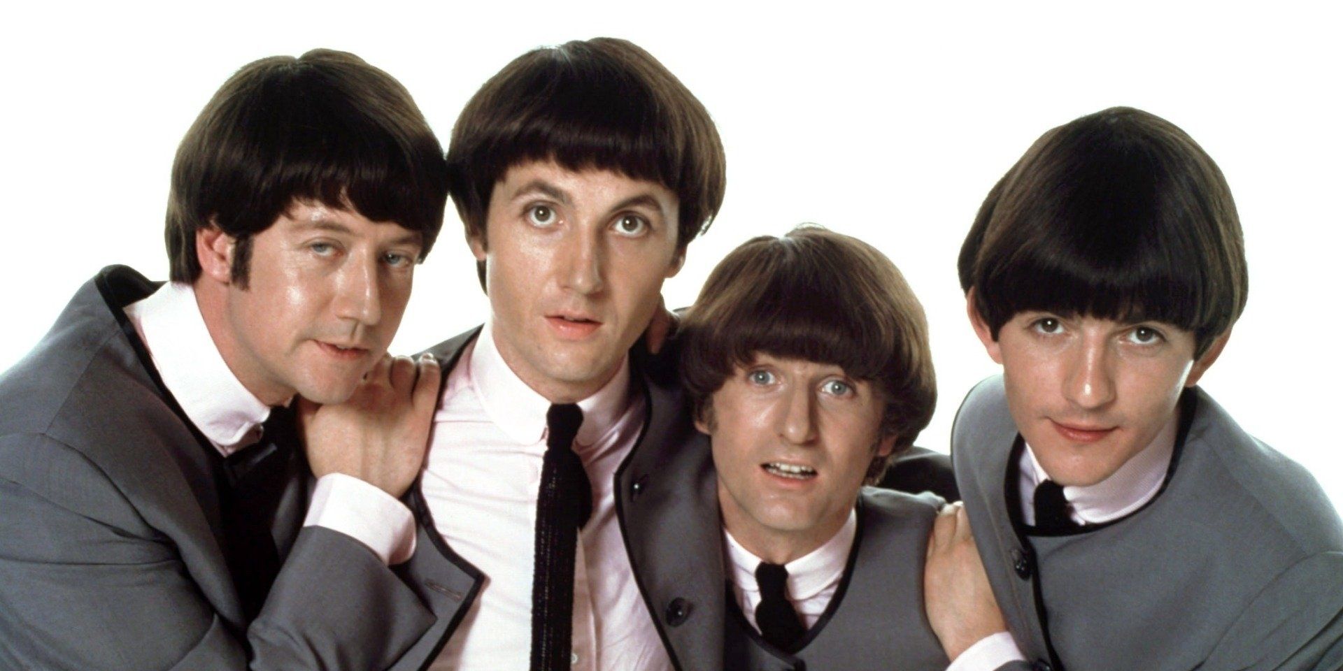 Actors dressed like The Beatles in Birth of the Beatles