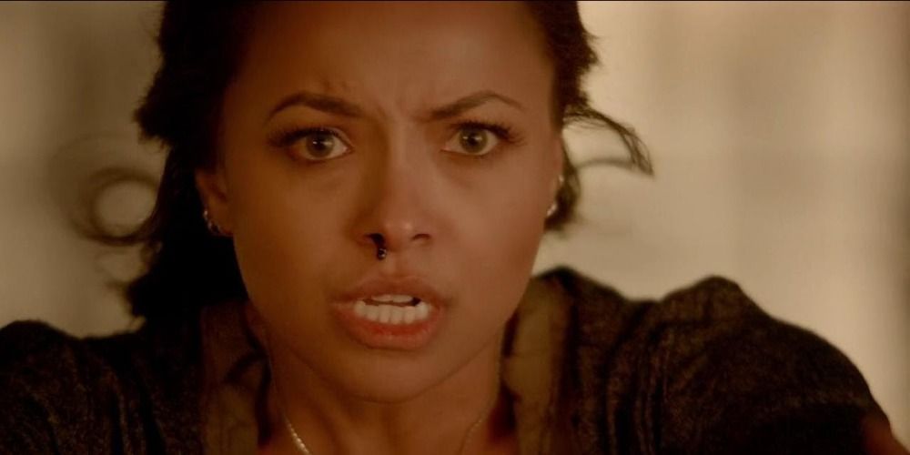 Bonnie with blood coming out of her nose casting barrier spell in Vampire Diaries