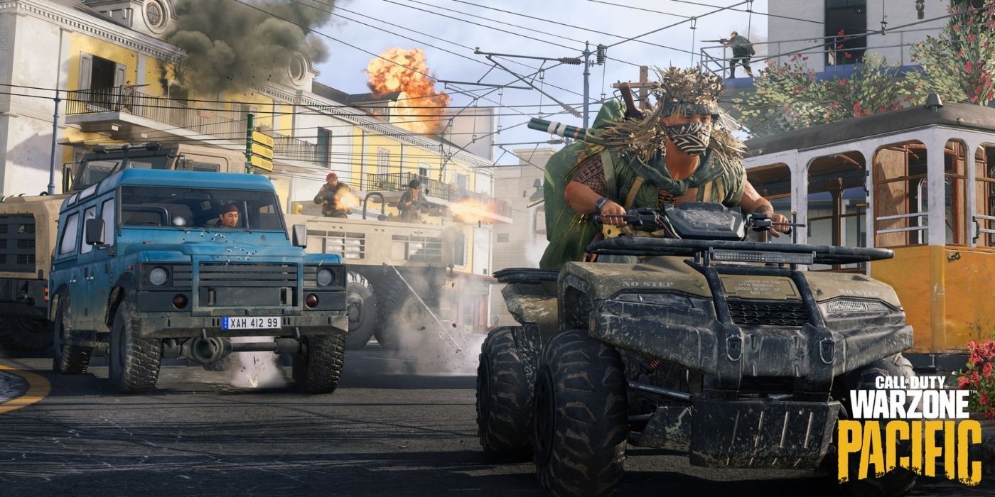 Two vehicles going down a street in Call of Duty Warzone Pacific