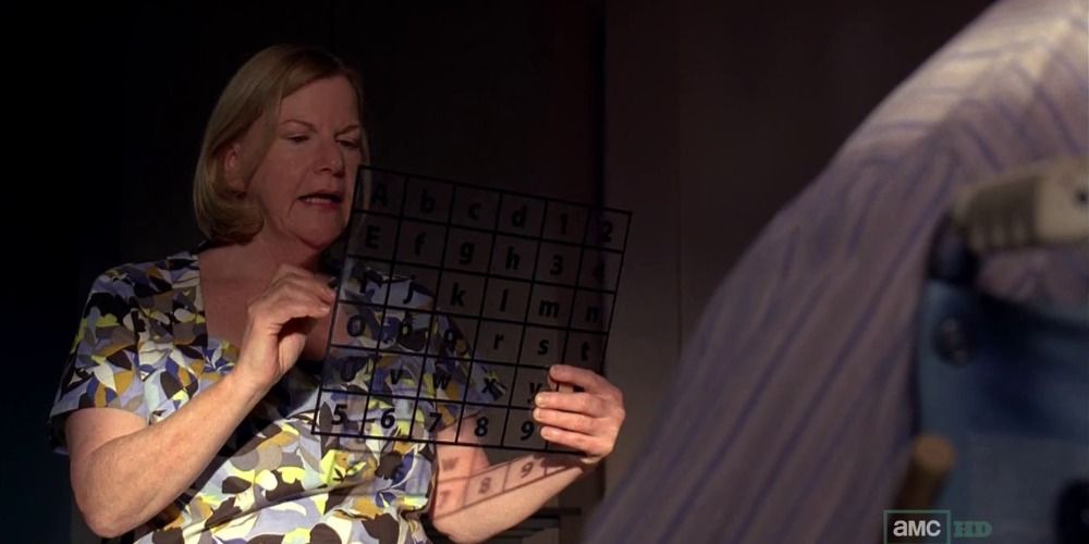 The Casa Tranquila caregiver helps Hector spell out letters in Breaking Bad