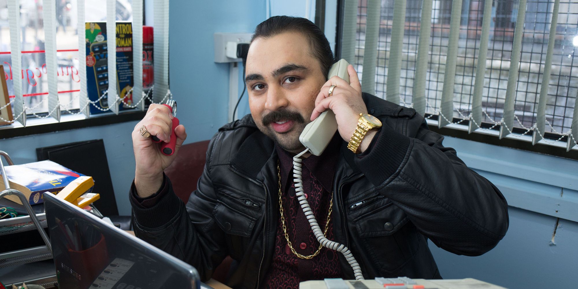 Chabuddy G on the phone in People Just Do Nothing