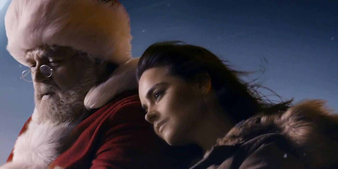Clara rests her head on Santa's shoulder in Doctor Who