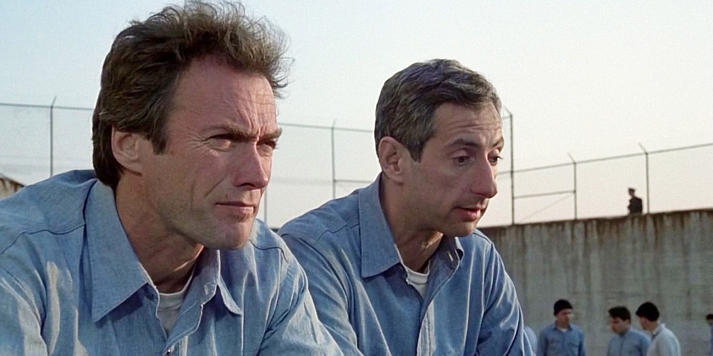 Clint Eastwood sitting in the prison year in Escape From Alcatraz