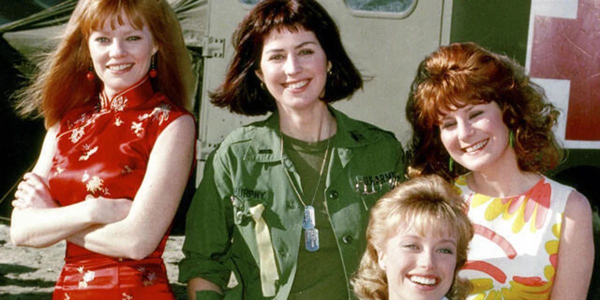 Colleen McMurphy poses with 3 other females in China beach.