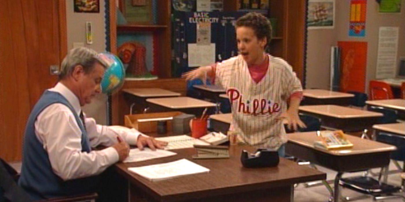 Cory talking to Mr. Feeny at his desk at school on Boy Meets World