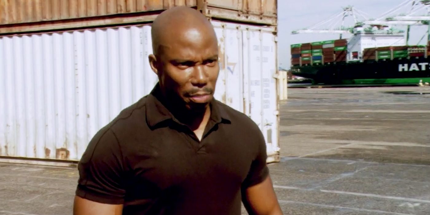 Doakes standing in a shipyard in Dexter