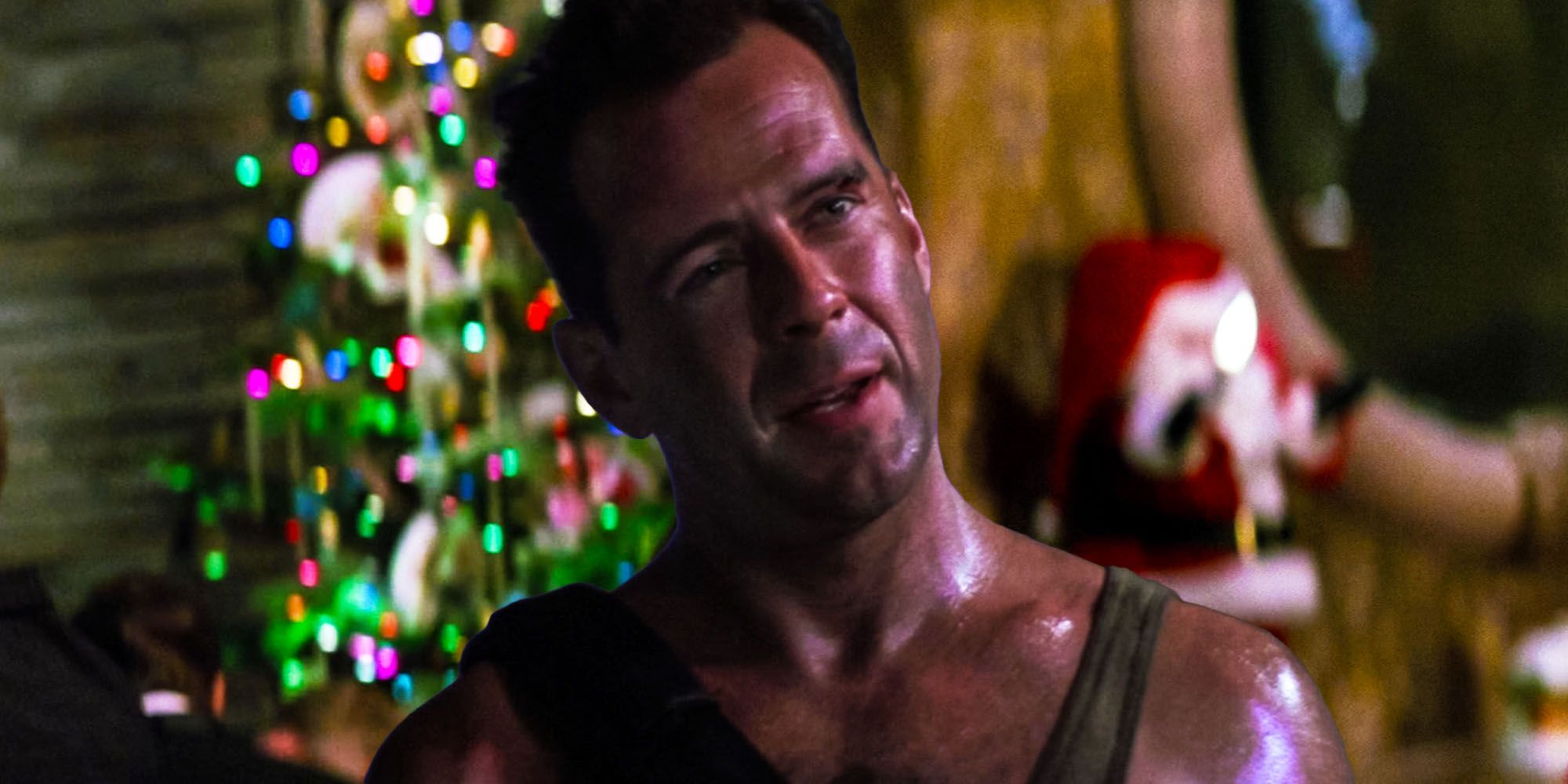 Bruce Willis's John McClane winking in front of a Christmas tree in Die Hard