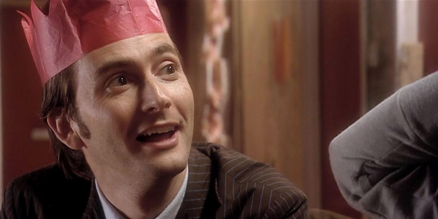 Doctor Who looks at Rose at Christmas dinner