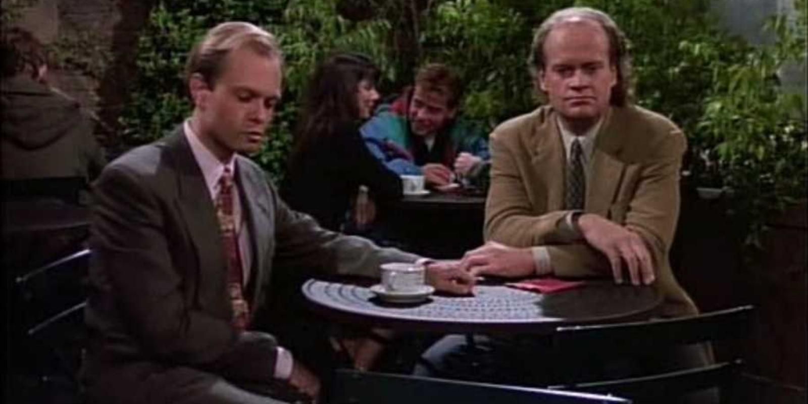 Frasier and Niles Crane drink coffee outside of Cafe Nervosa in Frasier