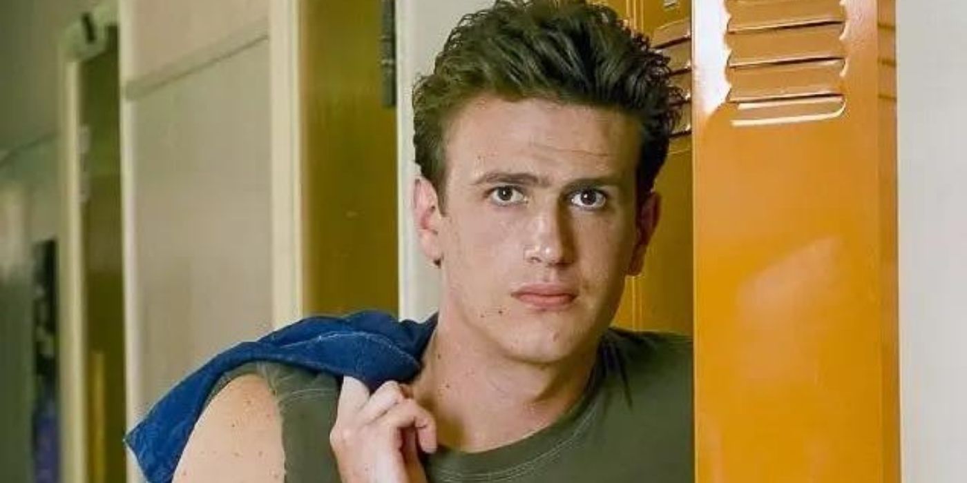 Nick posing next to the lockers in Freaks and Geeks