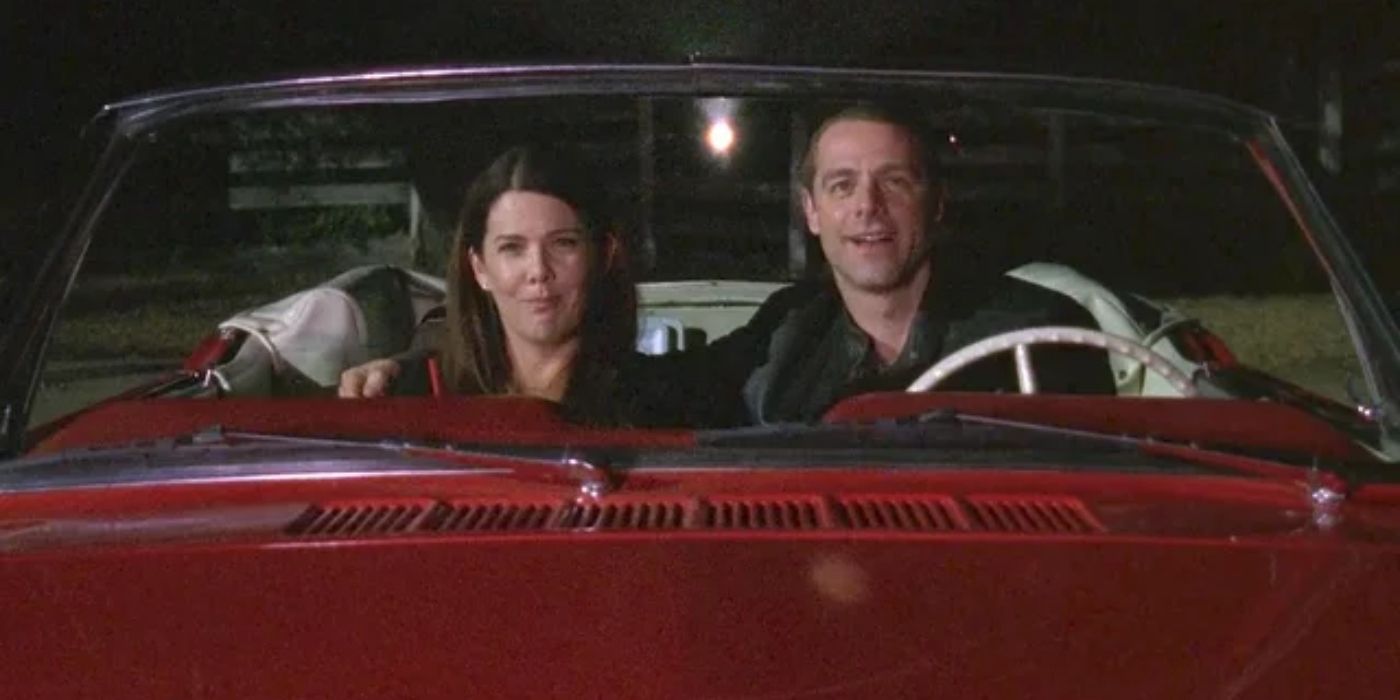 Lorelai and Christopher sitting in a car on a date on Gilmore Girls