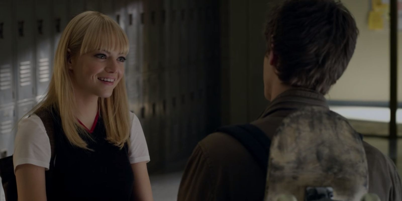 Gwen Stacy smiling at Peter stumbling over his words in The Amazing Spider-Man 2012