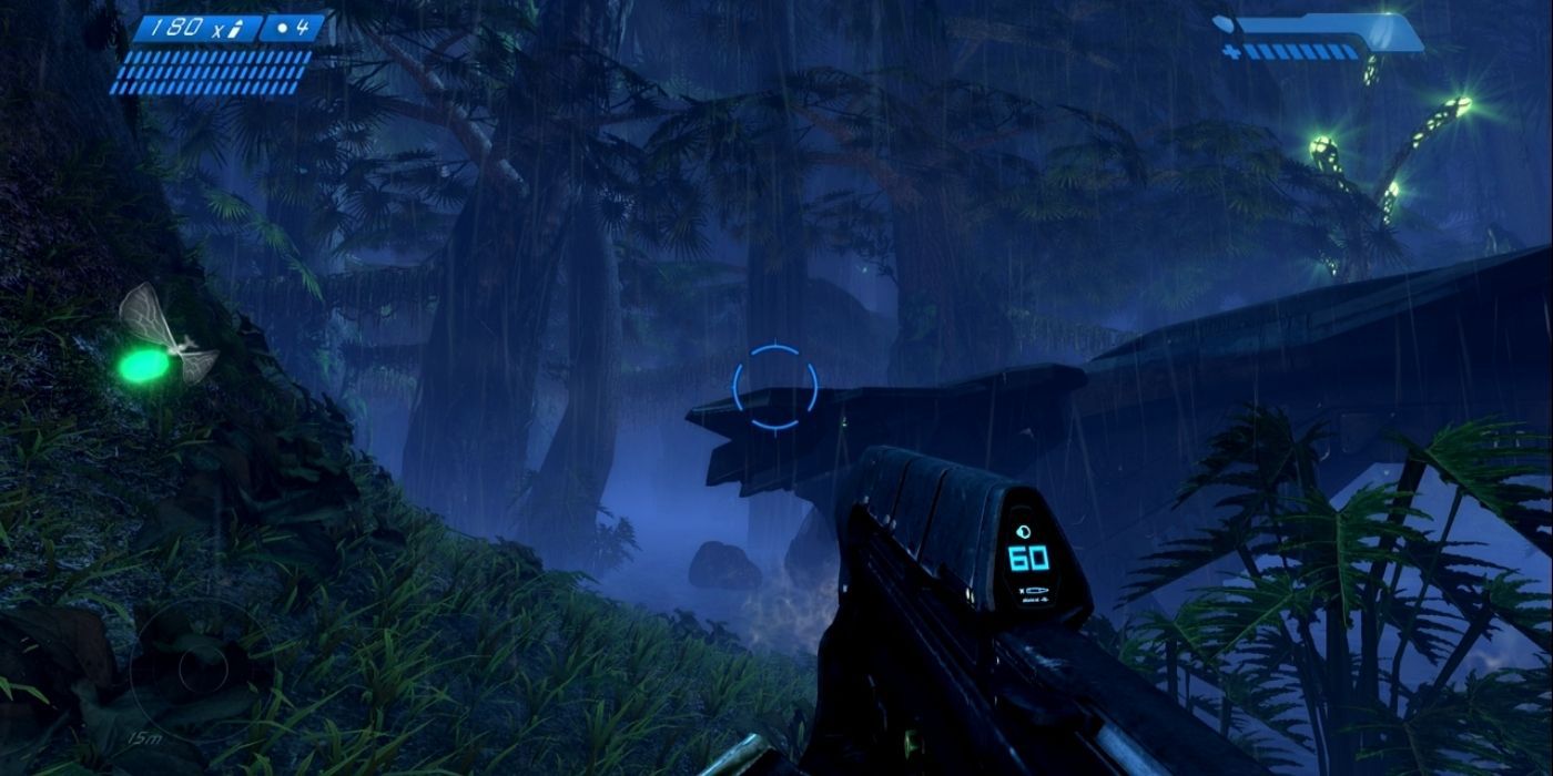 First-person view of a shooter in a rainy jungle in Halo CE