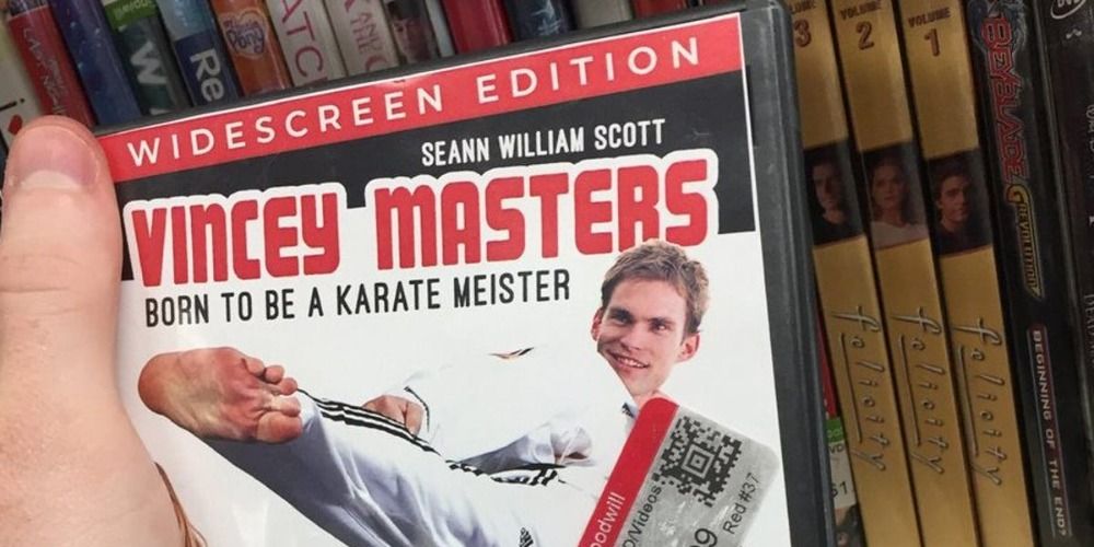 Hand holding a DVD copy of Vincey Masters