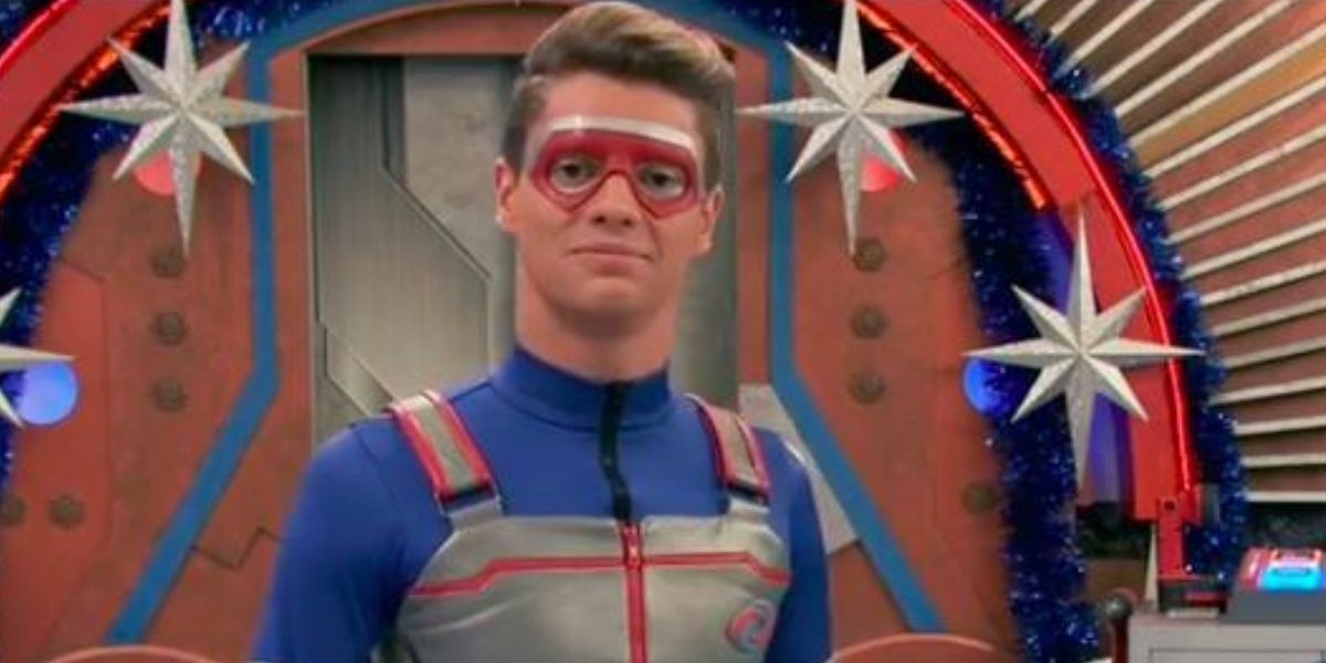 Henry Danger in front of paper snowflakes recording a video in Henry Danger